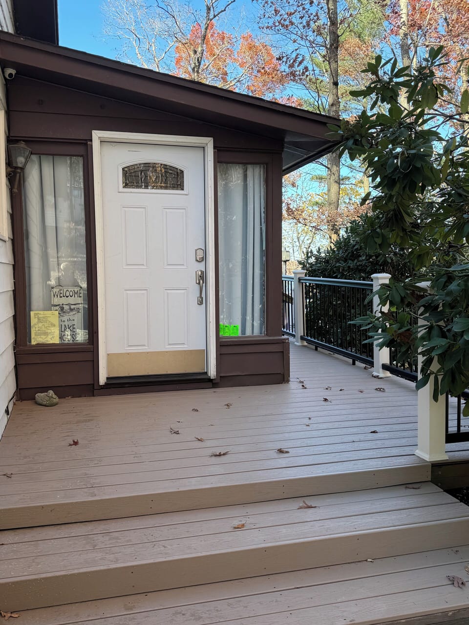 Front door with decking leading to the back deck.