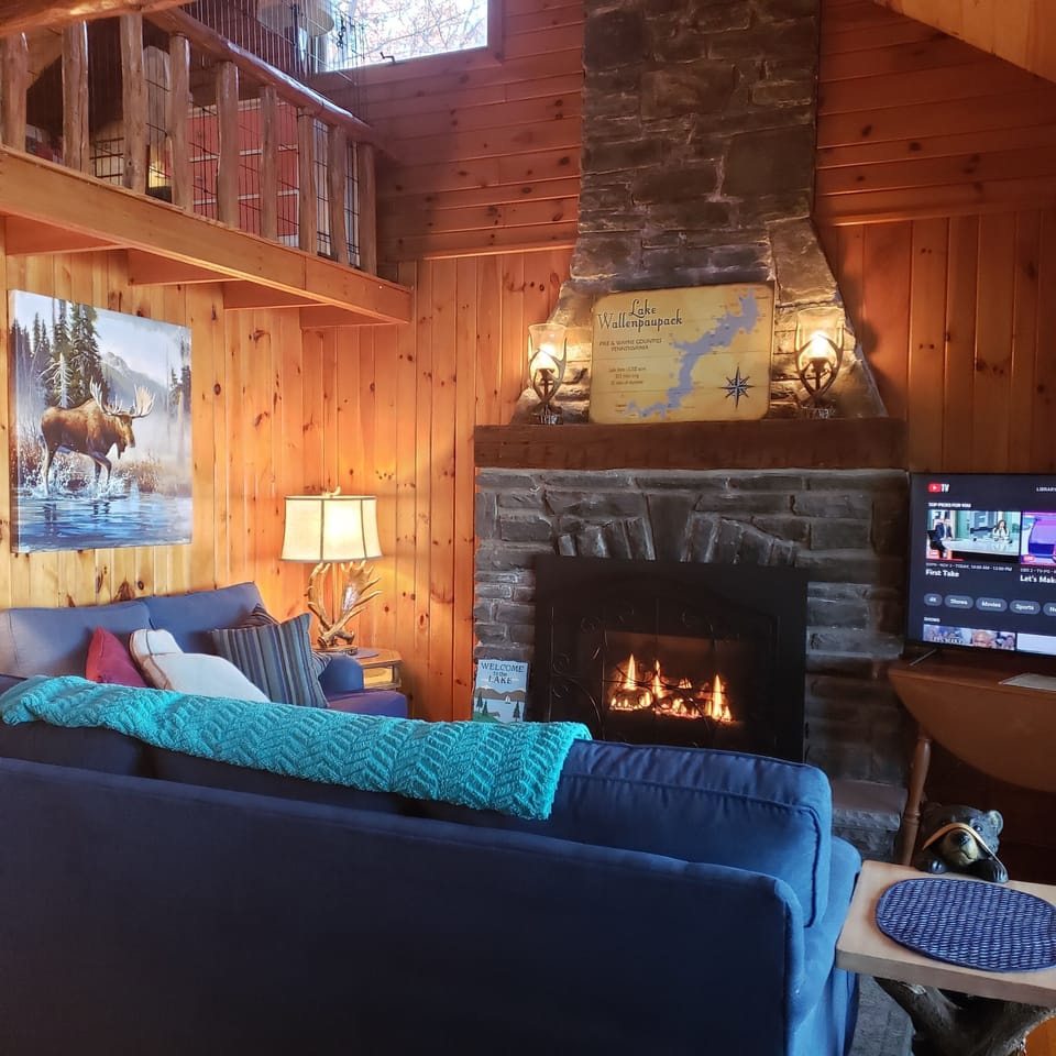 Family room w/propane fireplace,50inchTV, couch &loveseat, & recliner(not shown)