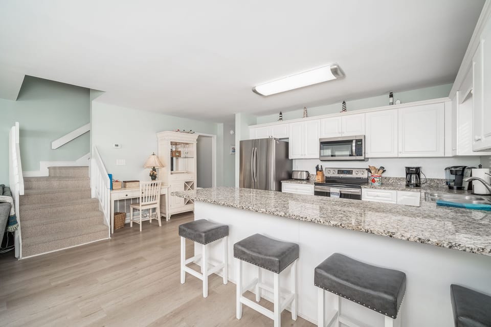 Walk into the home and you are greeted by a well equipped kitchen