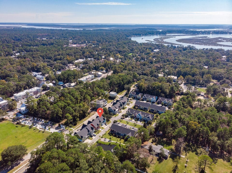 Drone shot marking our home and relationship to May River.  15 minute walk