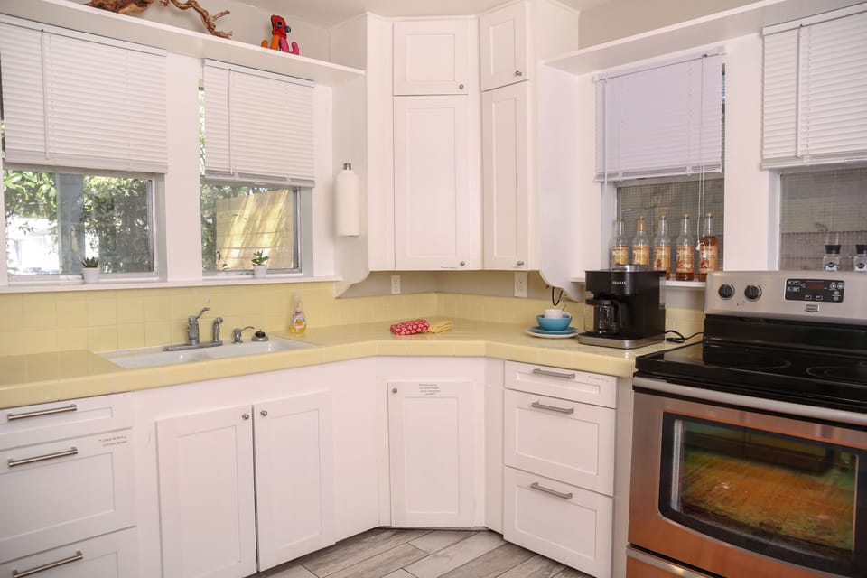 Cookware, dishes, icecream maker, popcorn maker provided. 