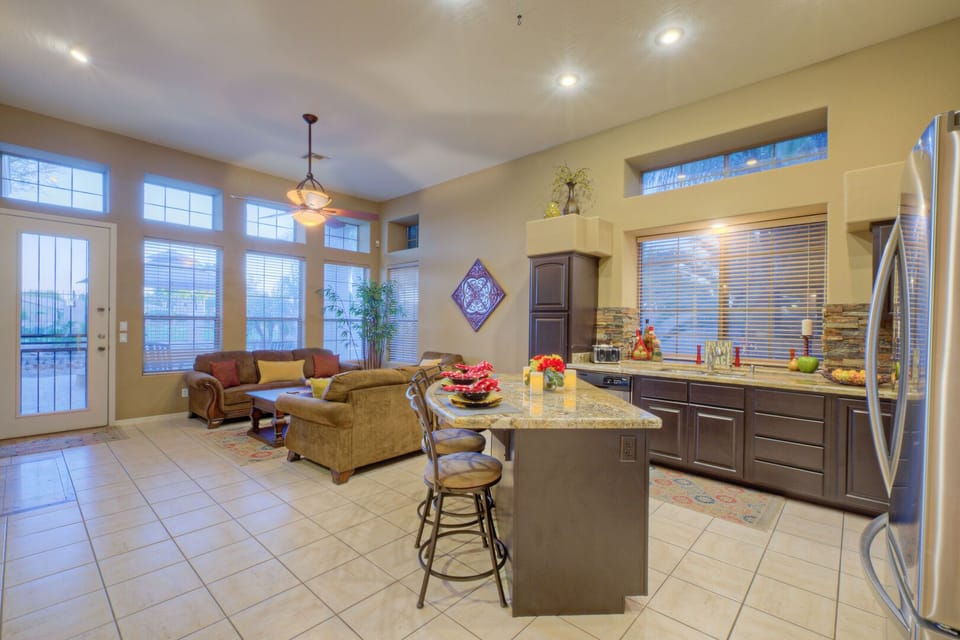 Great room with open kitchen provides a wonderful gathering place for families.