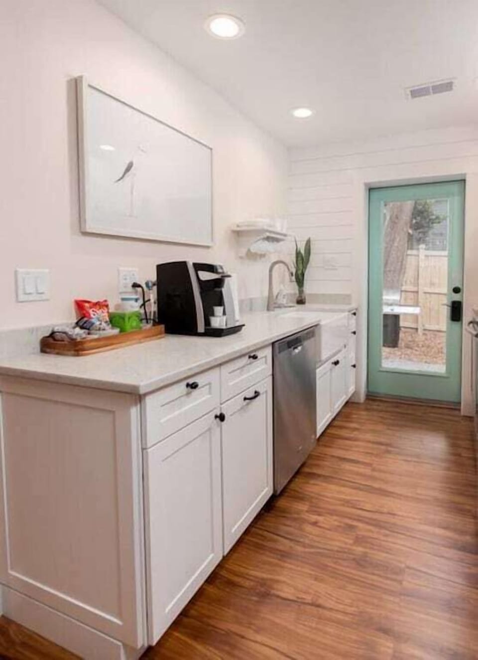 Dishwasher, plumbed Keurig, whisper garbage disposal