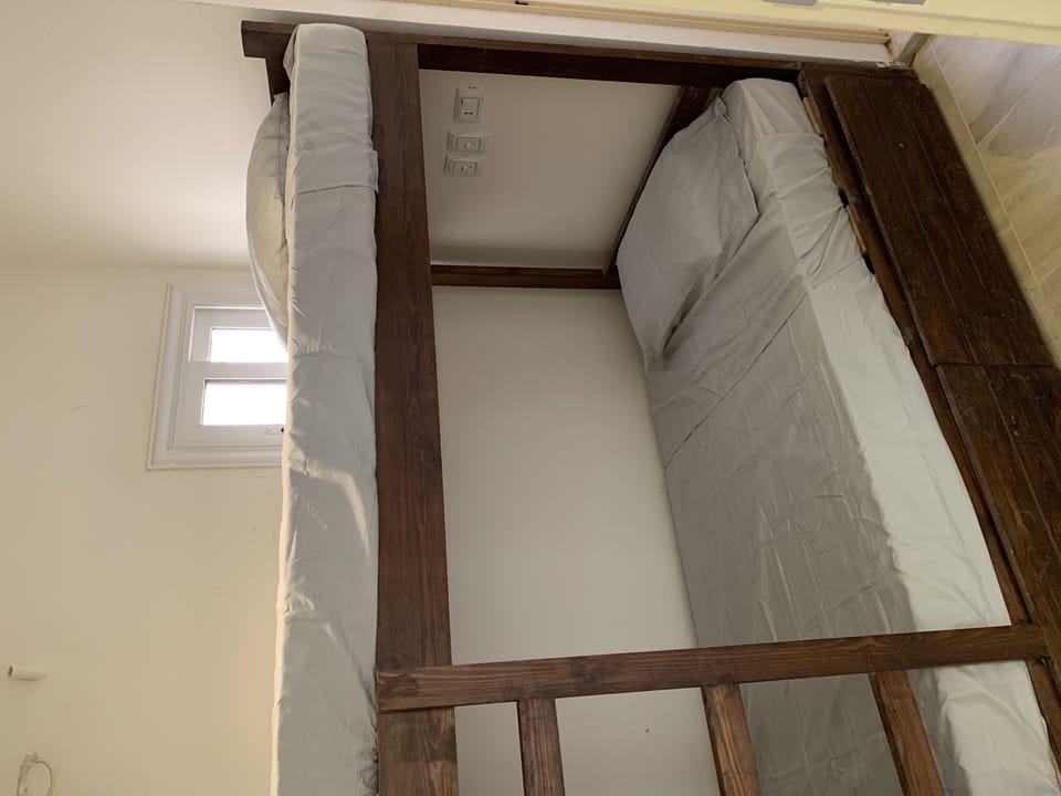 Two bunkbeds with bath as Made or kids room