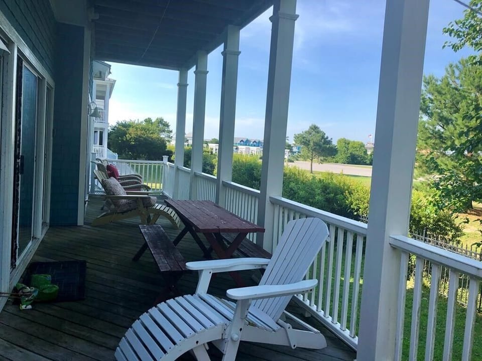 Expansive decks on three levels and a second floor screened porch provide ample 