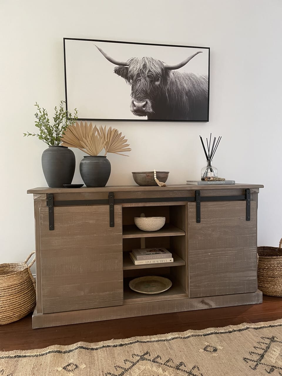 Foyer furniture stocked with games and decorating flair.