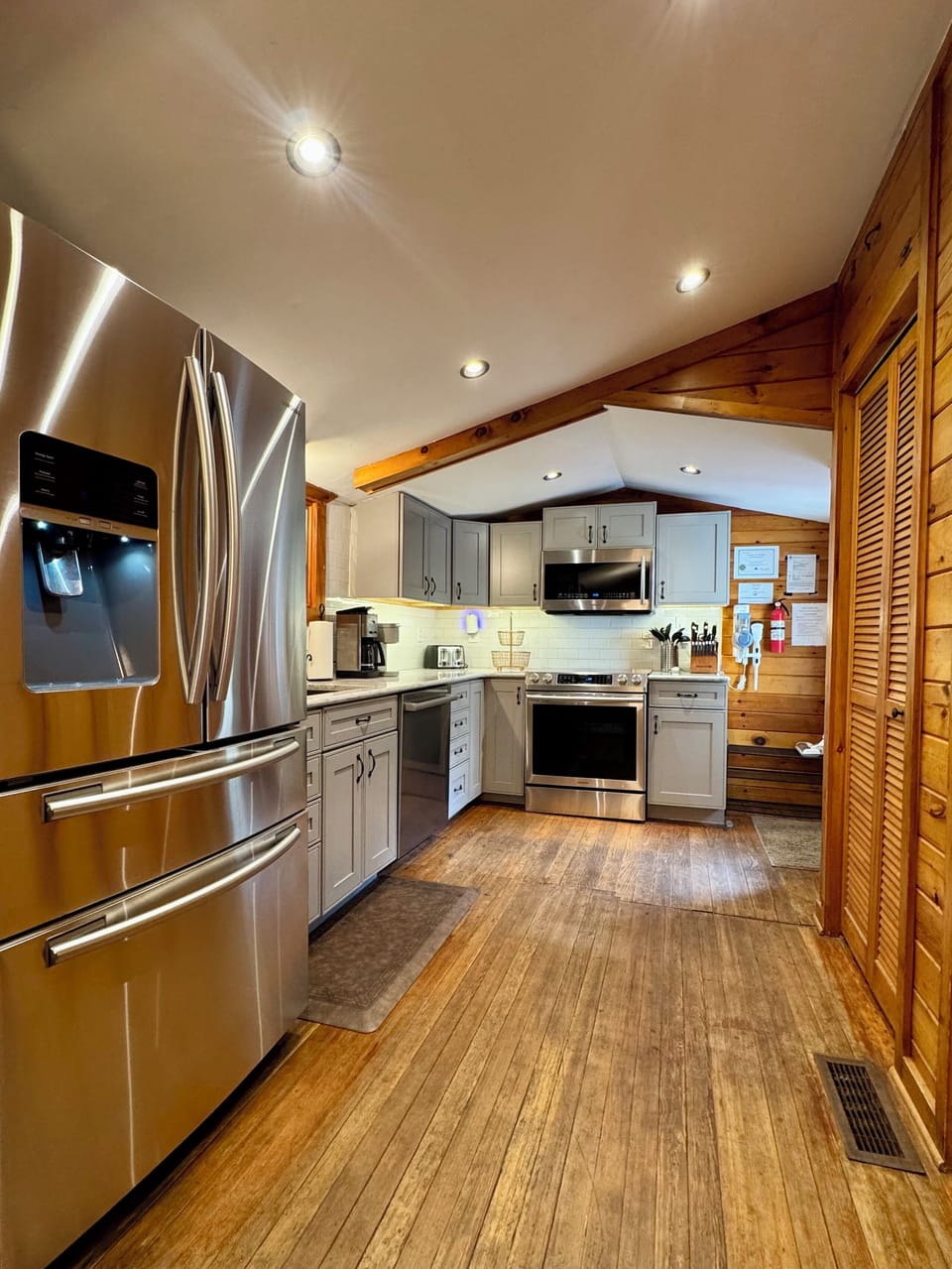 Modern cabin kitchen with stainless appliances