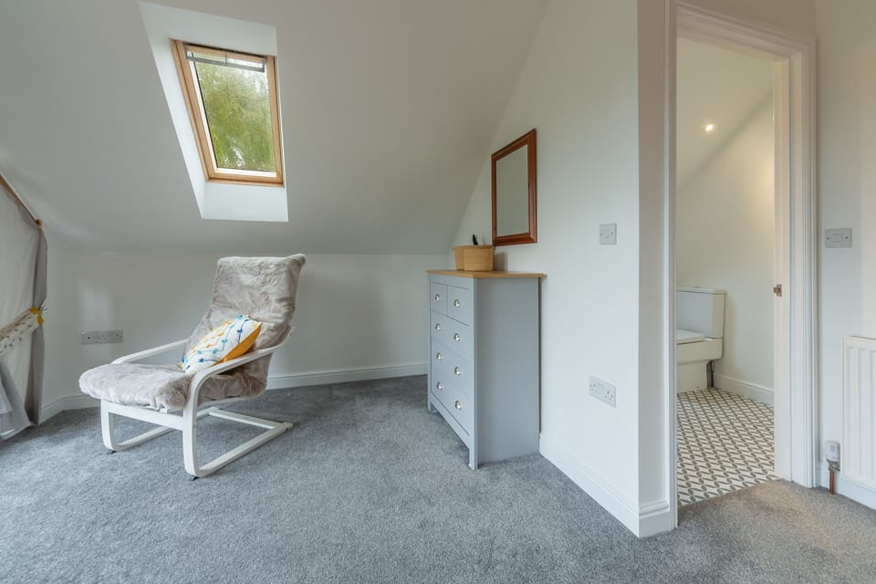 First Floor: Master bedroom with en-suite shower room off