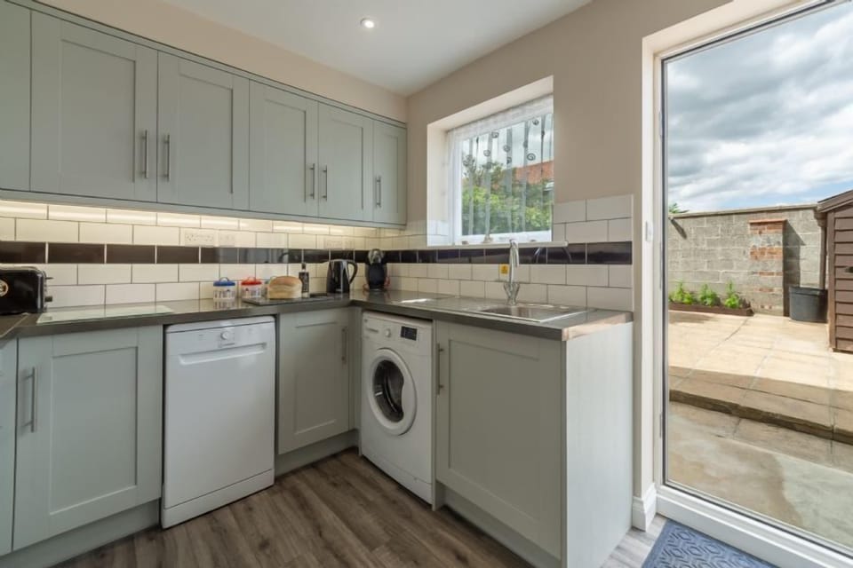 Ground Floor: Kitchen with door to courtyard garden