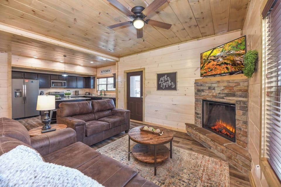 The heart of the home awaits in the Great Room, where a warm fireplace invites you to unwind and create lasting memories. 55" HDTV, Smart TV's throughout the home
