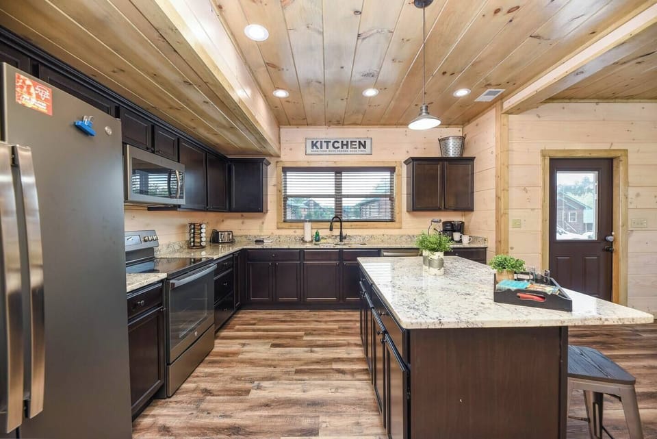 Main level: Fully Stocked Kitchen with island