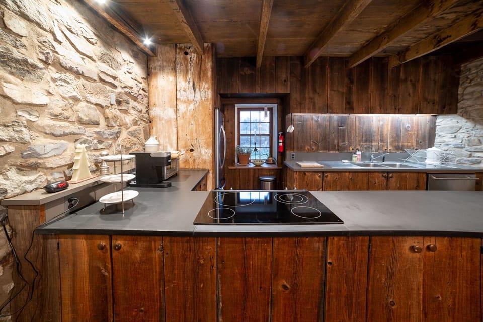 The kitchen with barn wood cabinets