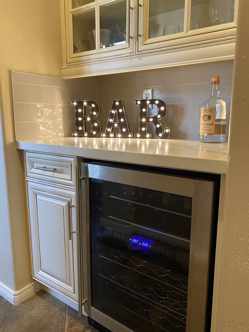 Bar with stocked bar tools and outdoor glassware