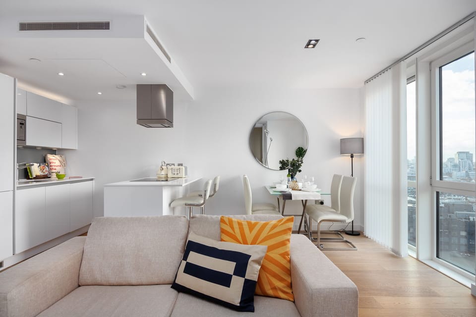 Large windows in living room for airy feel.
