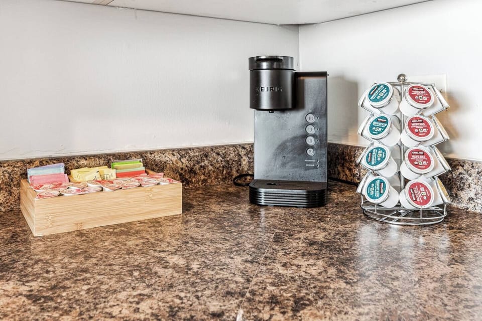 Get caffeinated with our Keurig coffee maker. Tea packets, cream and Splenda are readily available. :)