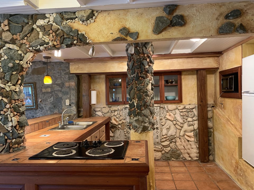 Kitchen area because it is fun to cook, eat and drink here.