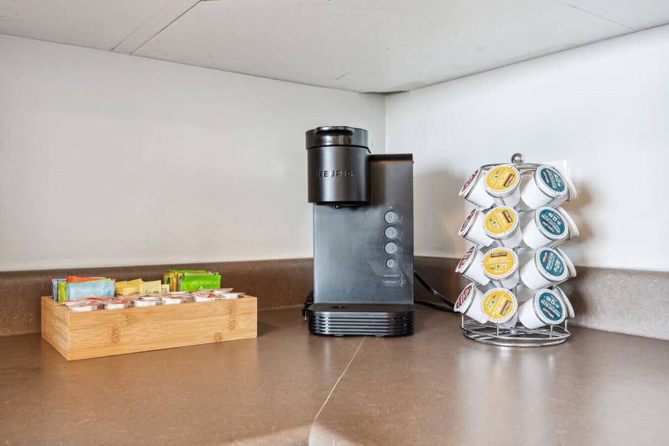Get caffeinated with our Keurig coffee maker. Tea packets, cream and Splenda are readily available. :)