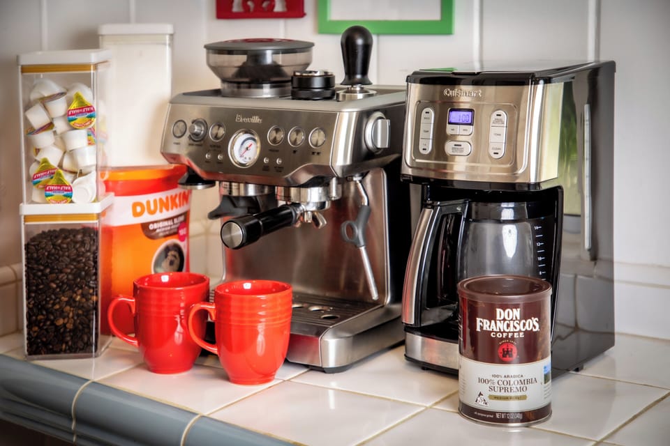 The Coffee Setup at the Emerald Bungalow. For all Coffee Lovers- Breville Espresso Machine, Cuisinart Drip Machine, ground and whole bean coffee provided as well as Creamer, Sugar and accessories for Coffee making. Mornings are soul southing with a cup of hot Coffee!