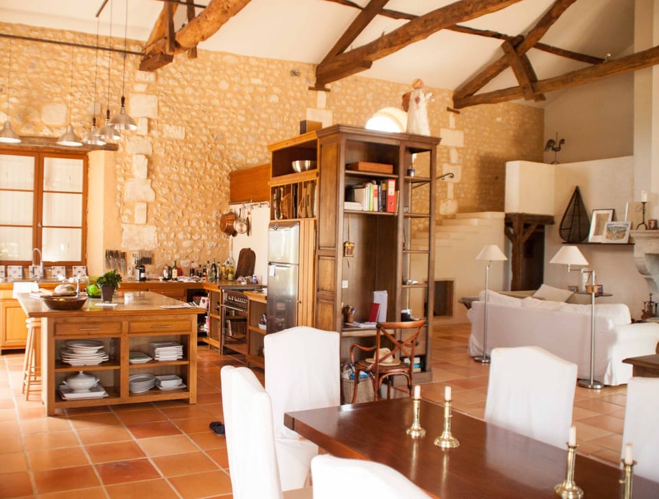 Main House - Dining Area with Kitchen in background