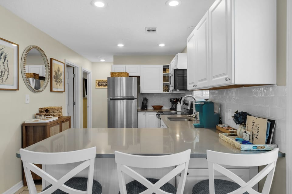 Remodeled kitchen with larger layout and cabinet for extra food storage