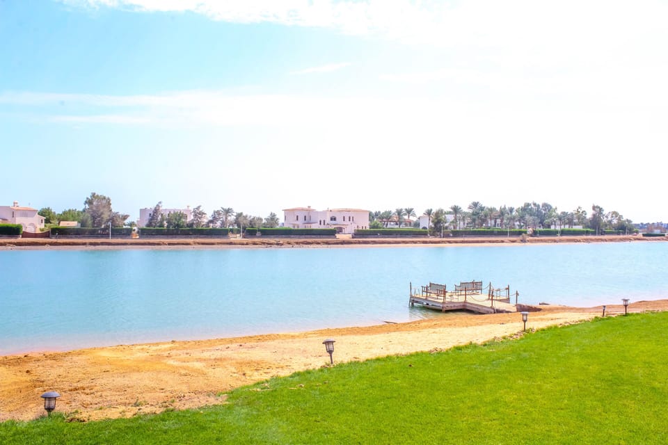 Private sand beach and private dock for fishing or swimming