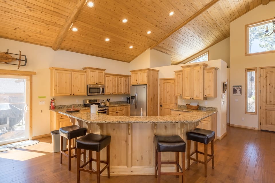 Convenient sitting around the granite counter with open
