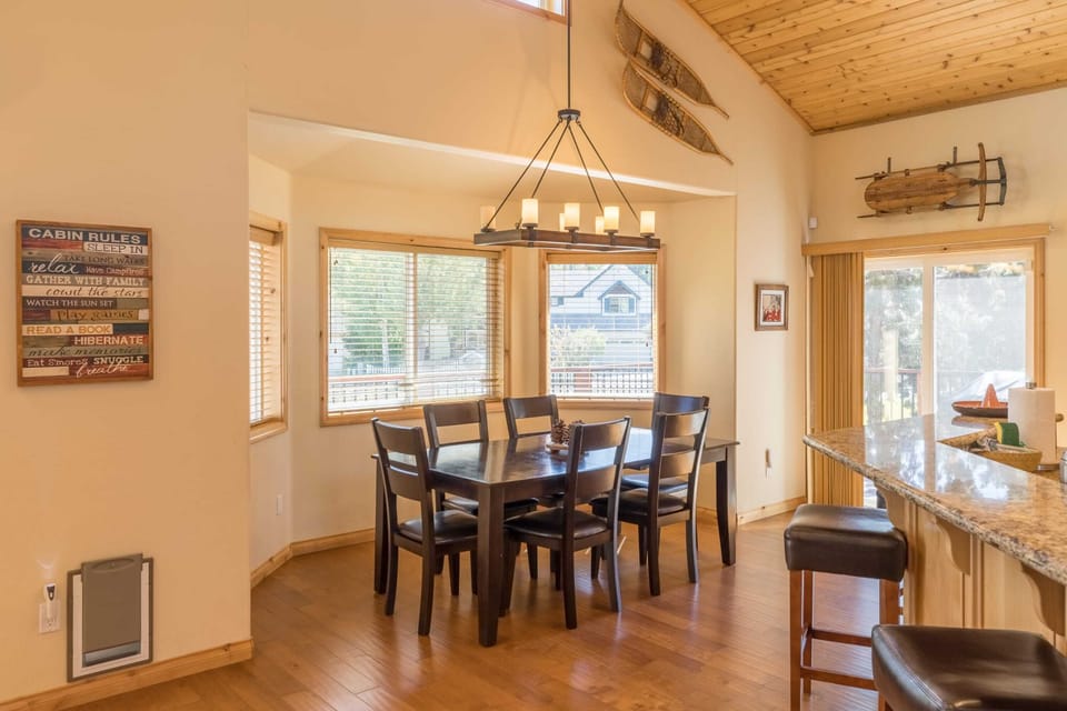 Dining area for six plus additional sitting at the breakfast bar.