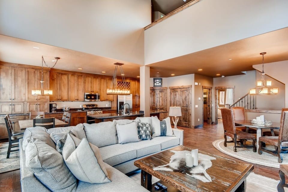 Open Living/Kitchen/Dining Area with 2 dining tables
