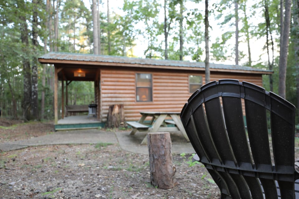 Outside dining area with fire pit. 4 outdoor sitting chairs provided for guests.