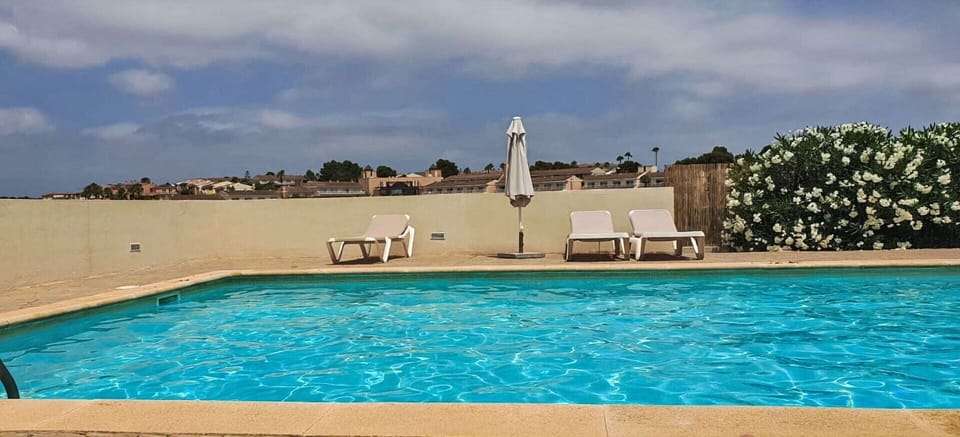 Water, Cloud, Sky, Rectangle, Swimming Pool, Leisure, Real Estate, Horizon, Natural Landscape, Building