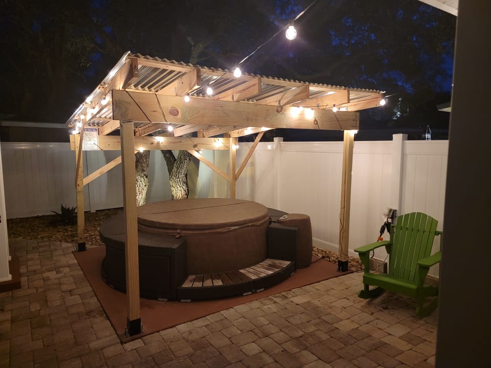 Very private hot tub in the back.  Lights up nicely at night. 