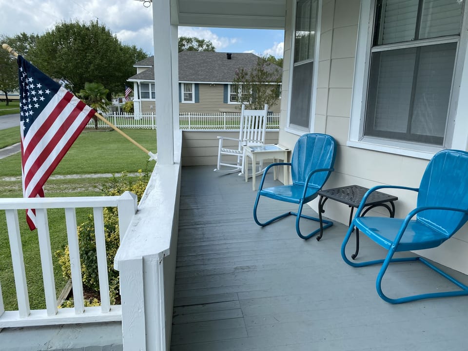 Enjoy relaxing evenings from the wide front porch