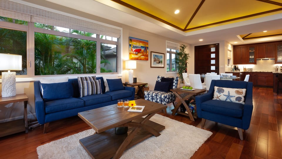 Open-concept great room with grass cloth ceilings