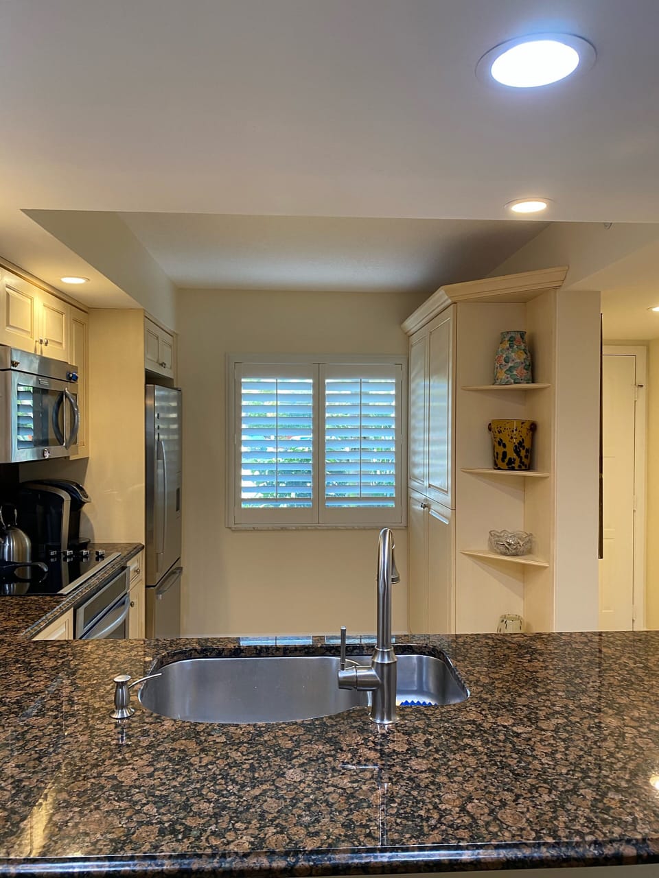 Granite countertop kitchen with stainless steel appliances