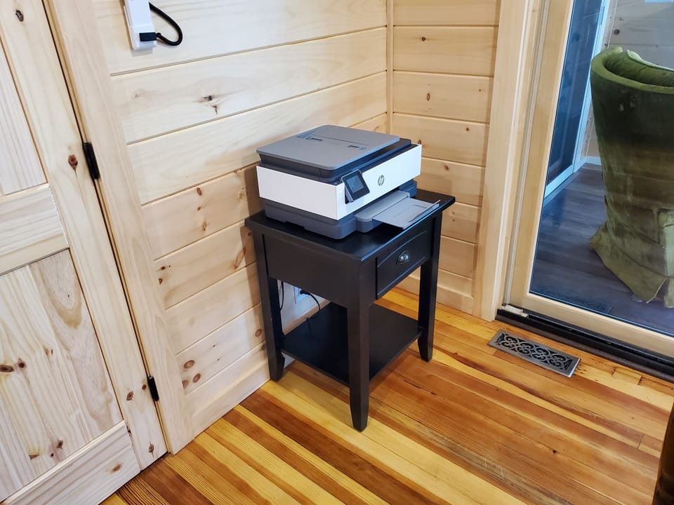 There is a network / WIFI printer for your use as your work gets done.