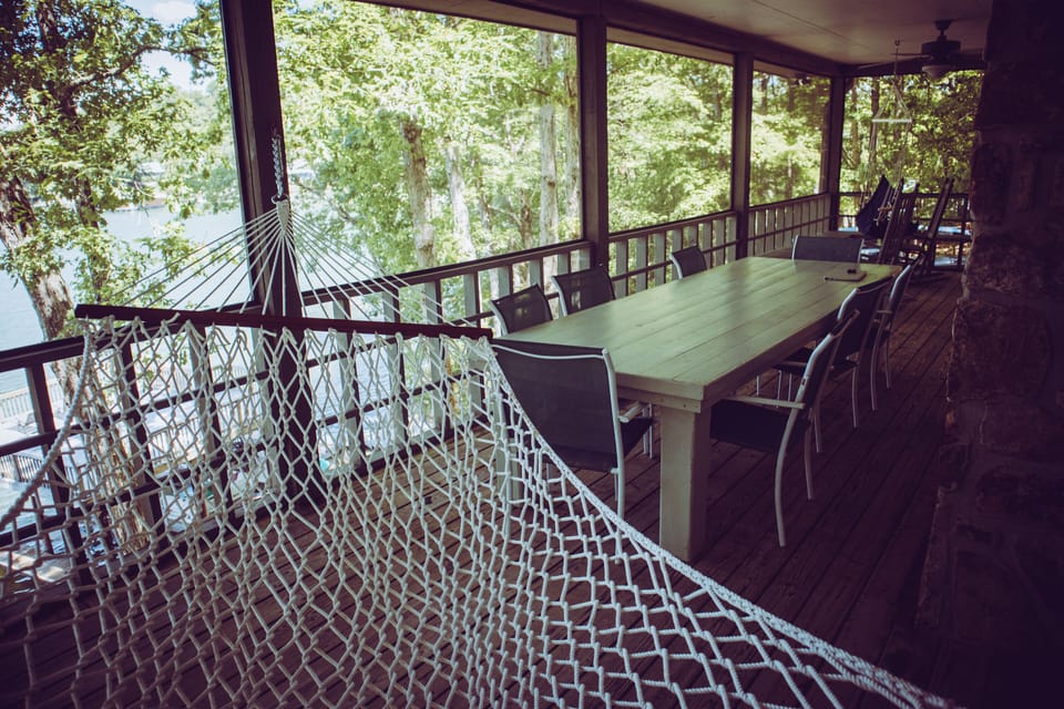 Huge screened in porch with table that seats 8-10. 