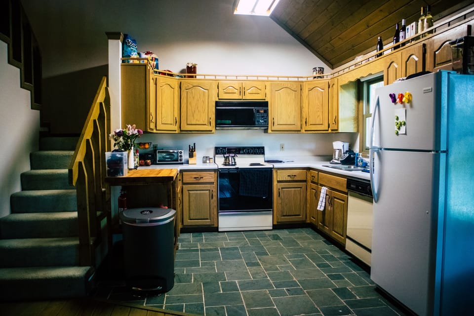Kitchen is fully stocked with all the pots and pans you need to cook