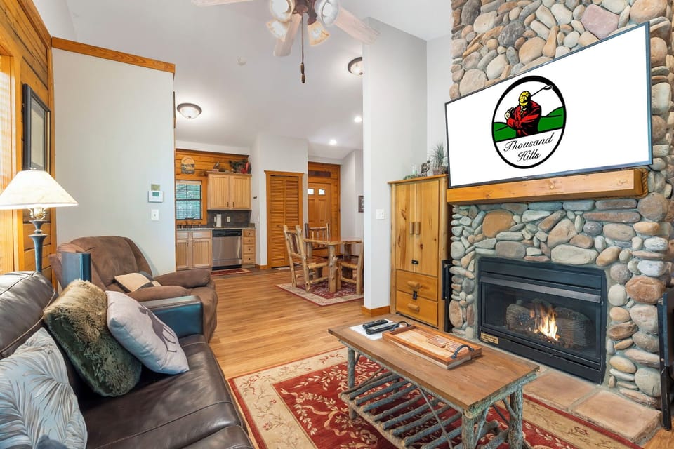 Living Room with Seasonal Gas Fireplace, Large screen TV, and Queen Size Sofa Bed