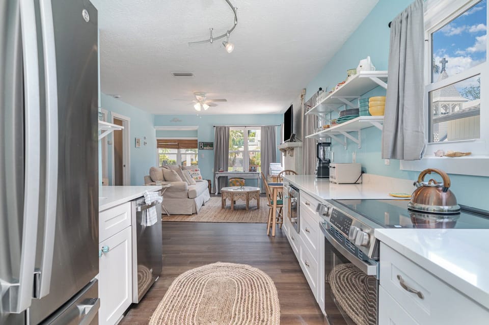 Beautiful new kitchen with quartz counters and stainless appliances