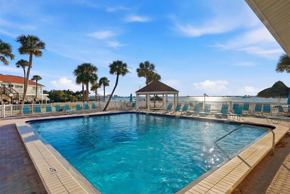 Waterfront Key West–style community—tropical elegance, stunning water views, glowing sunsets, and a laid-back island vibe 🌴🌅✨
