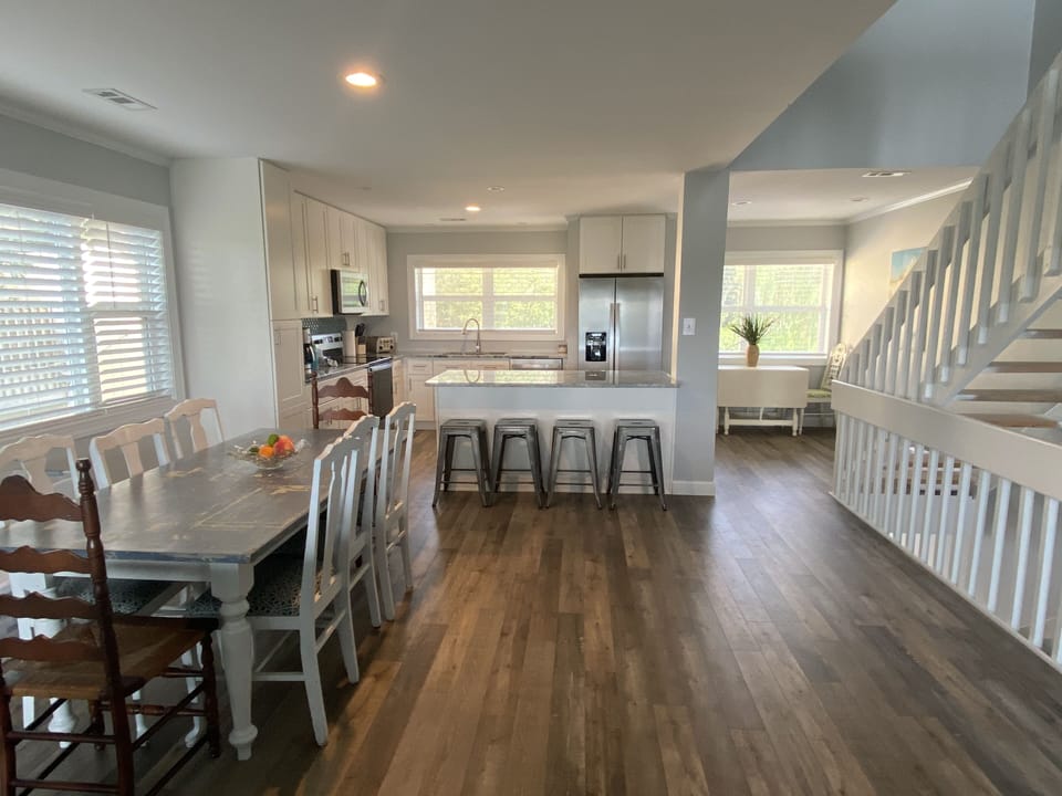 Open living space on main level...living room, dining area, and kitchen.
