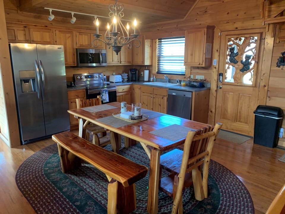 Beautiful open kitchen with redwood dining table for 7!