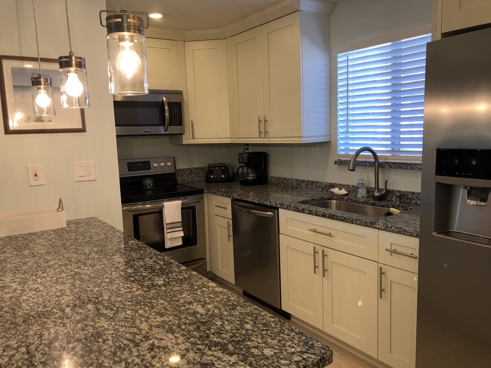 Fully stocked, updated kitchen and granite countertops