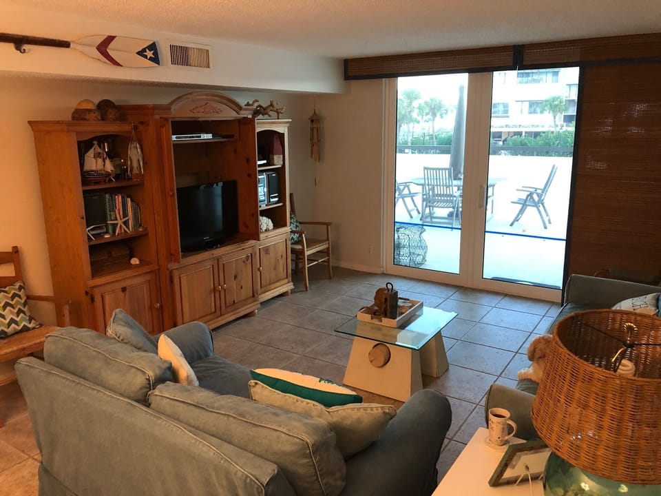 Living room, sliding door to large balcony.