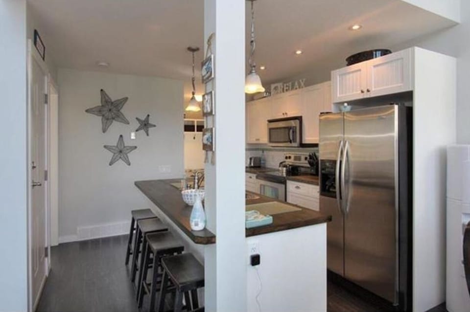 Sit at the kitchen island and chat with the cook!