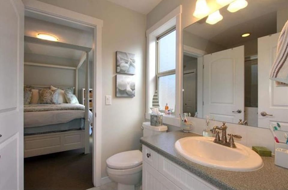 The main floor bathroom has a large shower stall.
