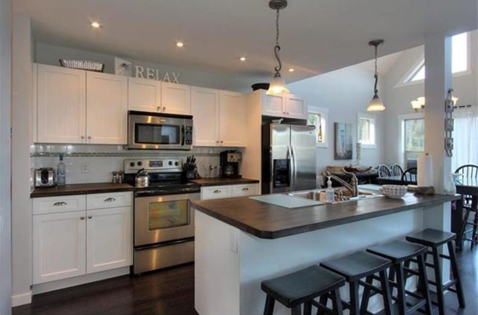 Cooking-lovers kitchen with updated appliances.  
