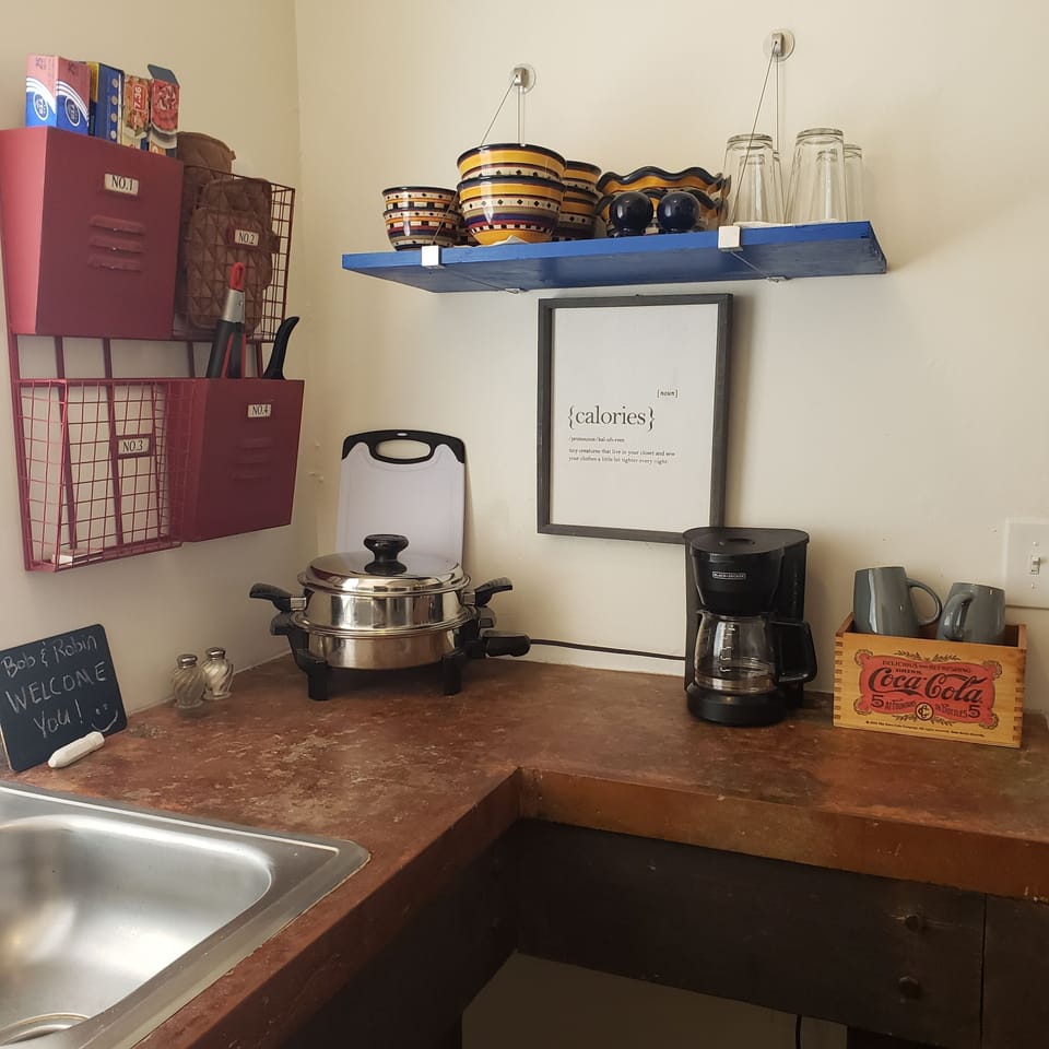 electric skillet and deep pot roaster, coffee pots, dishes etc. 