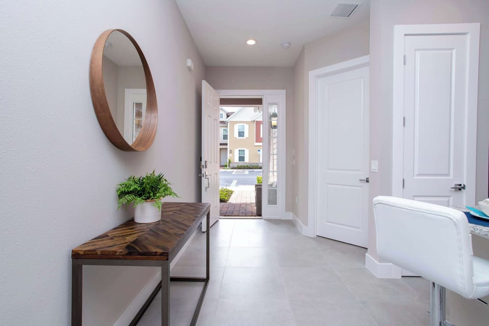 A stylish welcome awaits you. This modern entryway features clean lines and thoughtful decor, setting the tone for a relaxing and upscale stay in our beautiful 4-bedroom retreat.