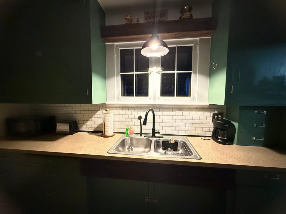 Beautiful newly renovated kitchen with lots of lighting and perfect to make a home cooked meal.